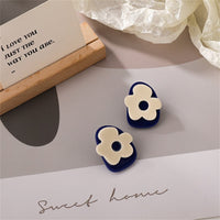 Blue & White Floral Stud Earrings
