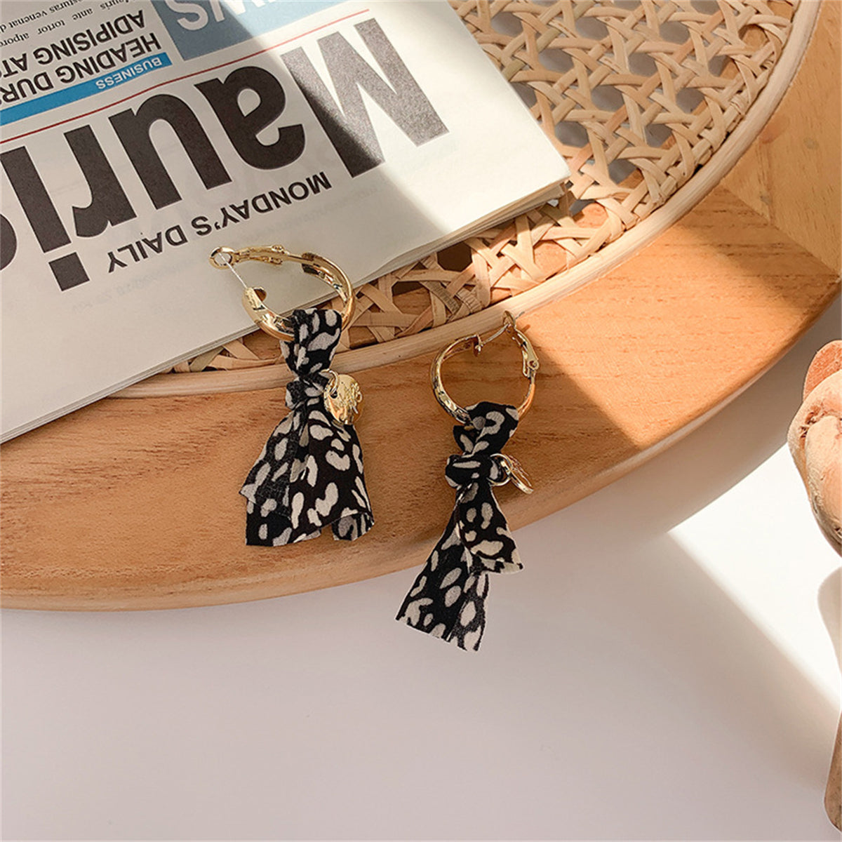 Black and 18K Gold-Plated Leopard Knot-Accent Drop Earrings, gold drop earrings for women, detail close-up