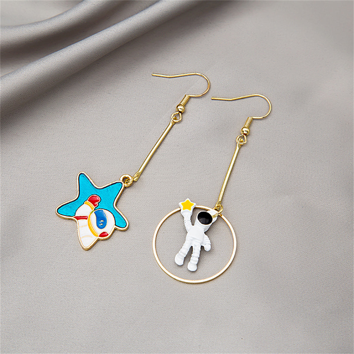 Blue Enamel and 18K Gold-Plated Star Astronaut Drop Earrings, gold drop earrings for women, botanical inspired, side view