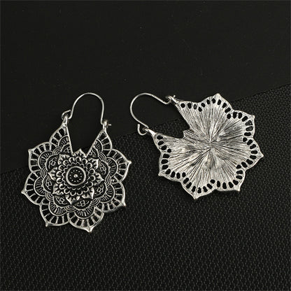 Silver-Plated Floral Huggie Earrings, silver huggie earrings, botanical inspired, side view