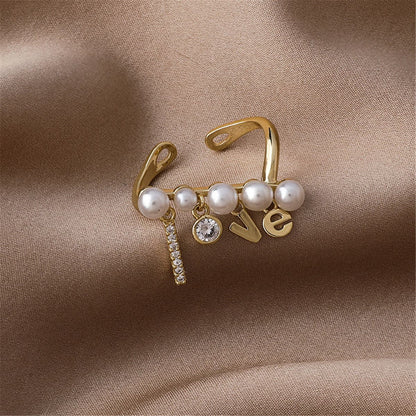 Pearl and Cubic Zirconia 'Love' Open Ring, statement rings for women, everyday style, front view