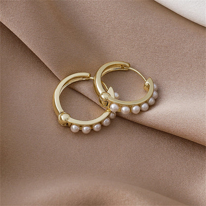 Pearl and 18K Gold-Plated Channel Huggie Earrings, gold huggie earrings, botanical inspired, lifestyle look