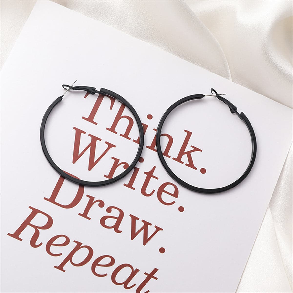 Black Hoop Earrings, dainty minimalist design, detail close-up
