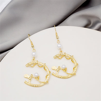 Pearl and 18K Gold-Plated Bird Circle Drop Earring, gold drop earrings for women, vintage-inspired design, lifestyle look