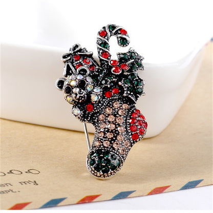 Red Cubic Zirconia and Silver-Plated Christmas Gift Box Stocking Brooch, silver brooch pin, front view