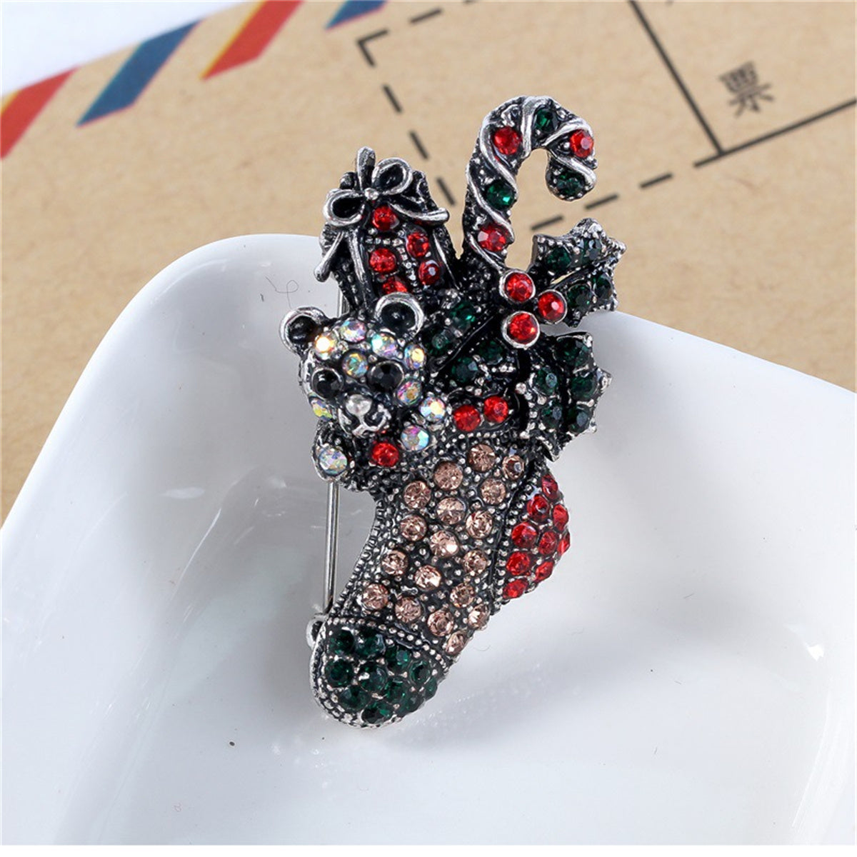 Red Cubic Zirconia and Silver-Plated Christmas Gift Box Stocking Brooch, silver brooch pin, detail close-up