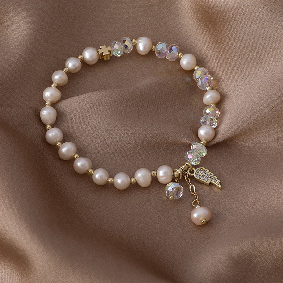 Pearl and Cubic Zirconia 18K Gold-Plated Wing Charm Stretch Bracelet, gold bracelet for women, everyday style, styled look