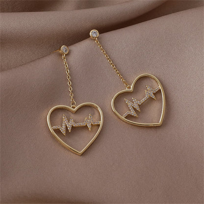 Cubic Zirconia and 18K Gold-Plated Heartbeat Drop Earrings, gold drop earrings for women, lifestyle look