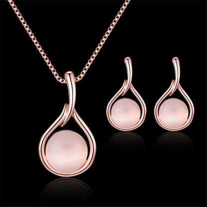 Rose Quartz and Cubic Zirconia Pendant Necklace and Drop Earrings, drop earrings for women, everyday style, side view