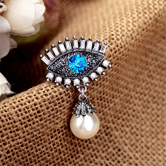 Blue Crystal and Pearl Silver-Plated Eye and Drop Brooch, silver brooch pin, botanical inspired, front view
