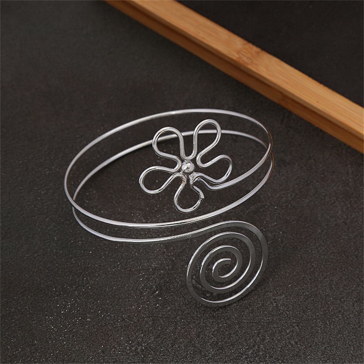 Silver-Plated Floral Swirl Arm Cuff, botanical inspired, side view