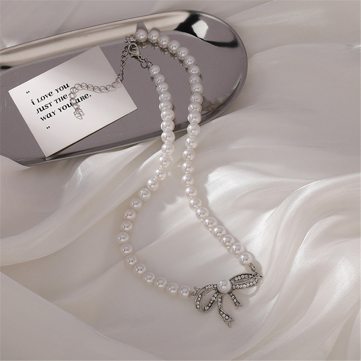 Cubic Zirconia and Pearl Beaded Bow Pendant Necklace, pendant necklace for women, everyday style, detail close-up