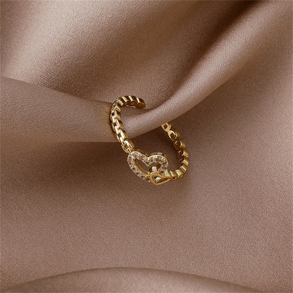Cubic Zirconia and 18K Gold-Plated Pavé Interlocked Open Heart Chain Ring, gold statement rings for women, detail close-up