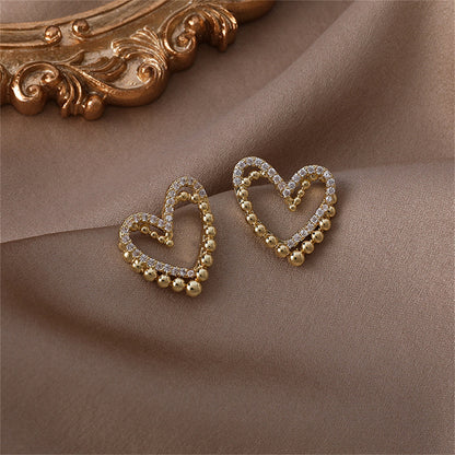 Cubic Zirconia and 18K Gold-Plated Interlocked Openwork Heart Stud Earrings, gold stud earrings for women, styled look