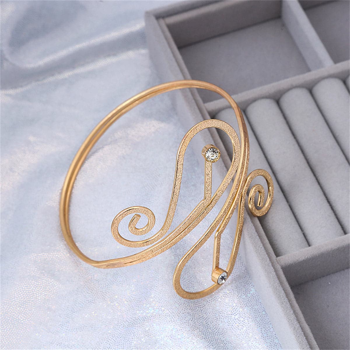 Cubic Zirconia and 18K Gold-Plated Frosted Geometric Arm Cuff, botanical inspired, detail close-up