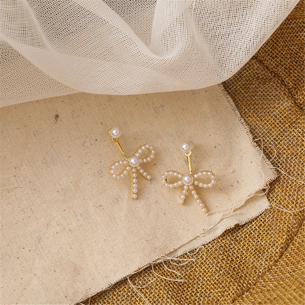 Pearl and 18K Gold-Plated Bow Ear Jackets, gold drop earrings for women, everyday style, lifestyle look