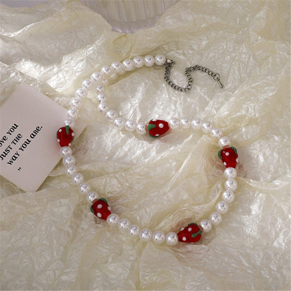 Pearl and Resin Silver-Plated Strawberry Station Necklace, silver pendant necklace for women, detail close-up