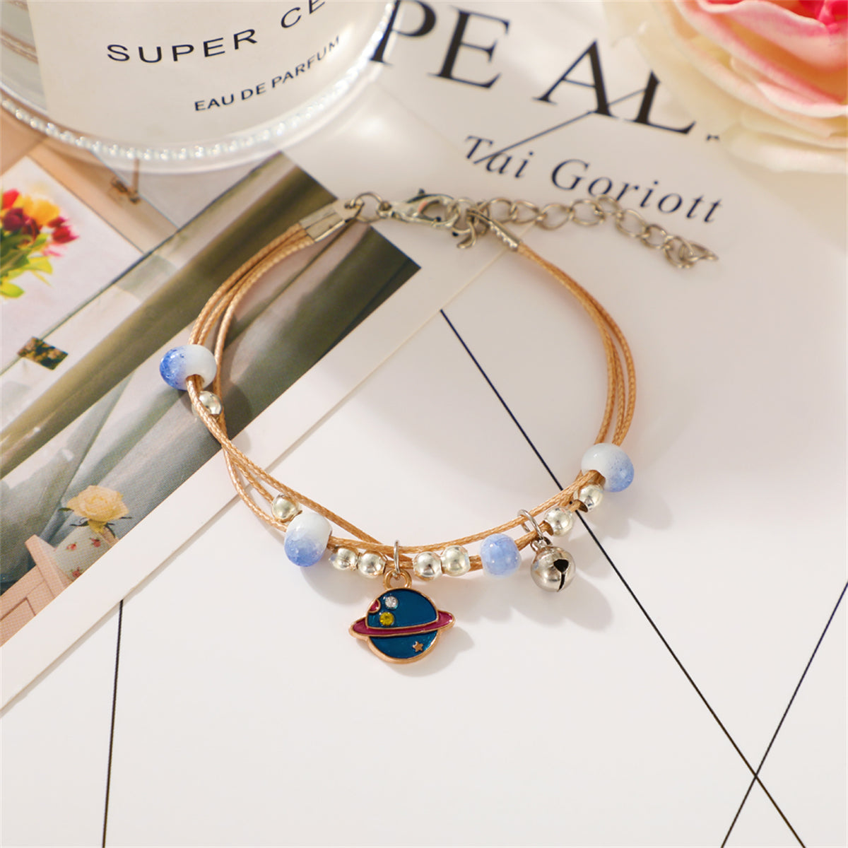 Cubic Zirconia and Blue Enamel Two-Tone Planet Layered Charm Bracelet, bracelet for women, everyday style, side view
