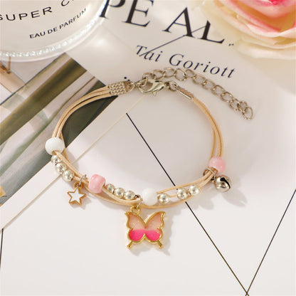 Pink Enamel and Two-Tone Buttefly Layered Charm Bracelet, bracelet for women, everyday style, side view
