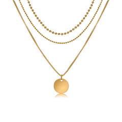 Stunning 18K gold-plated three-layer necklace with a disc pendant and two stylish chains, perfect for any outfit.