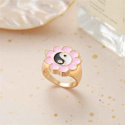Black Enamel and 18K Gold-Plated Yin Yang Flower Ring, gold statement rings for women, everyday style, detail close-up