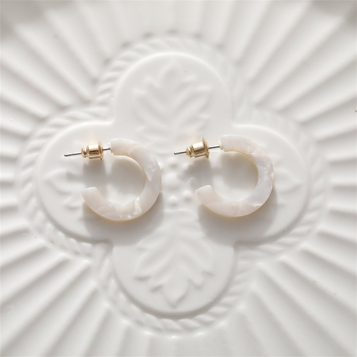 White Acrylic and 18K Gold-Plated Huggie Earrings, gold huggie earrings, dainty minimalist design, lifestyle look