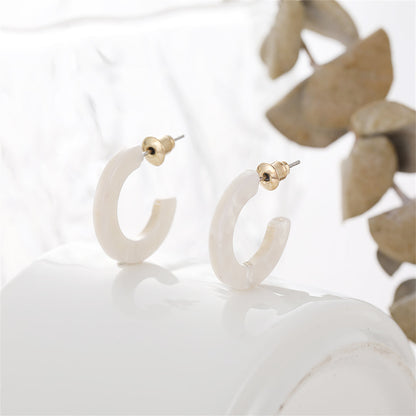 White Acrylic and 18K Gold-Plated Huggie Earrings, gold huggie earrings, dainty minimalist design, side view