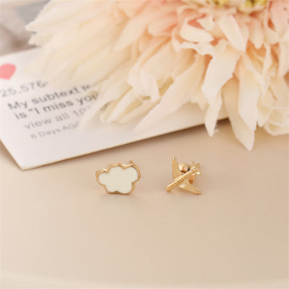 White and 18K Gold-Plated Airplane Asymmetrical Stud Earrings, gold stud earrings for women, detail close-up