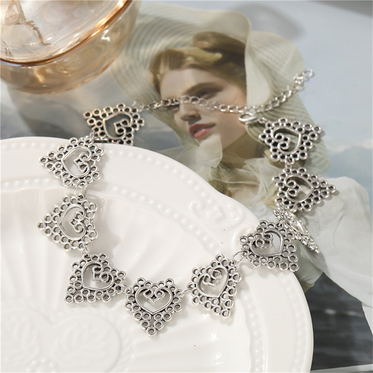 Silver-Plated Open Flower Heart Choker Necklace, silver pendant necklace for women, vintage-inspired design, side view