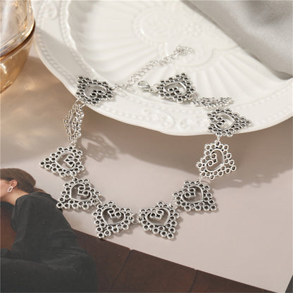 Silver-Plated Open Flower Heart Choker Necklace, silver pendant necklace for women, vintage-inspired design, lifestyle look