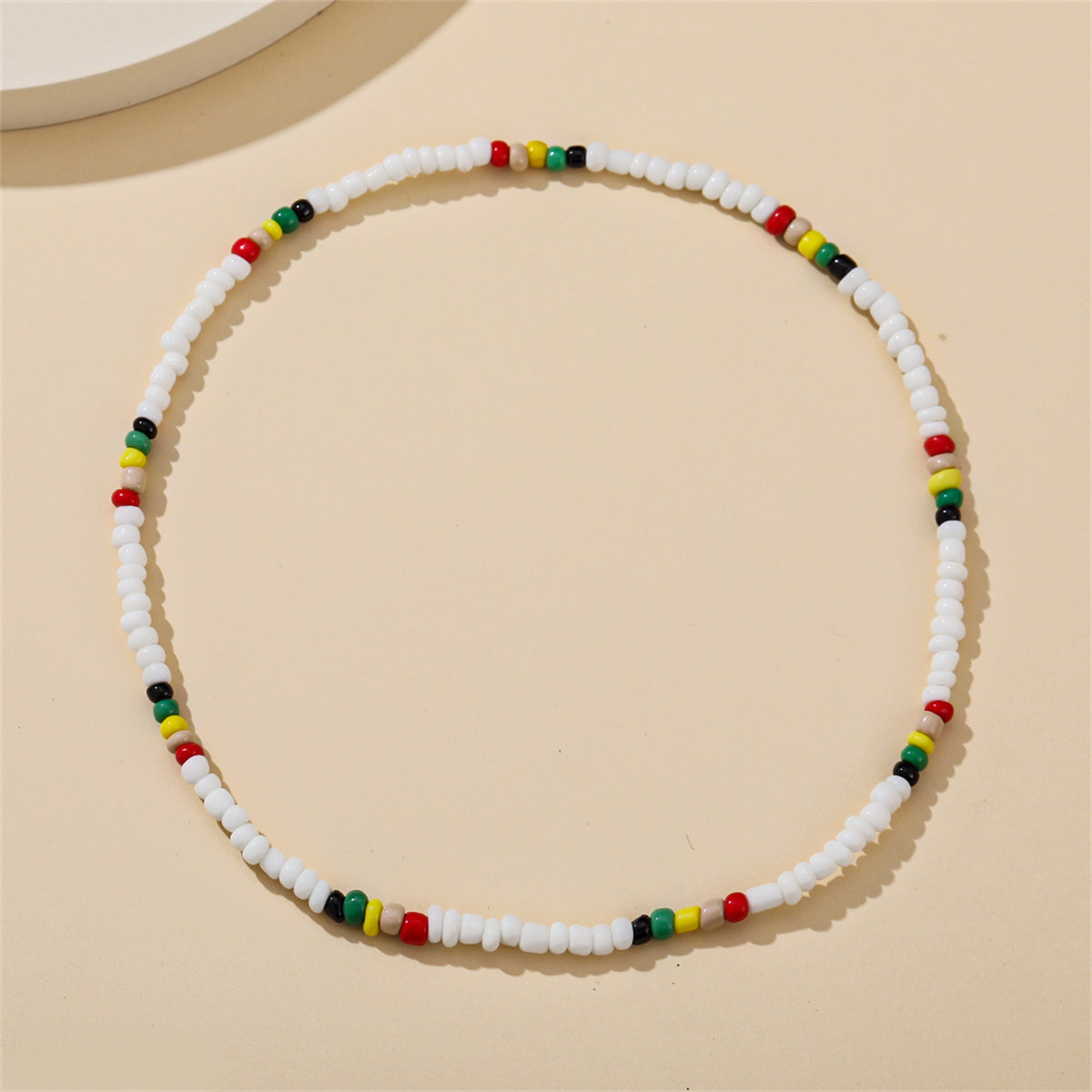 White and Multicolor Teal Howlite Stretch Necklace, pendant necklace for women, botanical inspired, side view