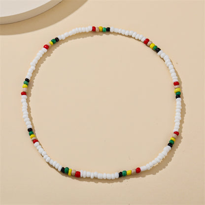 White and Multicolor Teal Howlite Stretch Necklace, pendant necklace for women, botanical inspired, side view