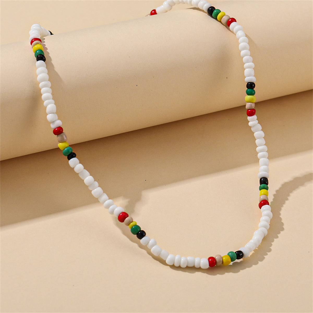White and Multicolor Teal Howlite Stretch Necklace, pendant necklace for women, botanical inspired, detail close-up