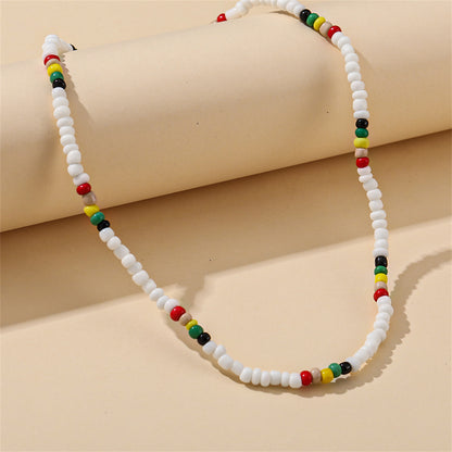 White and Multicolor Teal Howlite Stretch Necklace, pendant necklace for women, botanical inspired, detail close-up