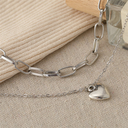 Silver-Plated Heart Layered Necklace, silver pendant necklace for women, everyday style, detail close-up