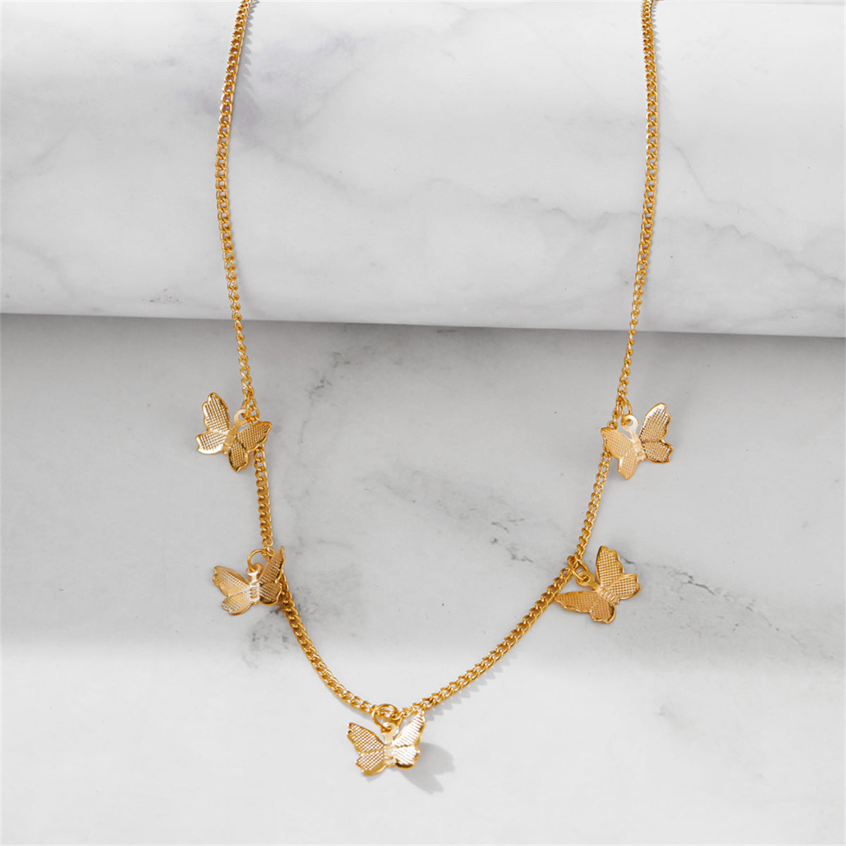 18K Gold-Plated Butterfly Station Choker, gold pendant necklace for women, vintage-inspired design, lifestyle look