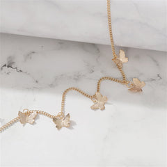 Beautiful 18K gold-plated choker showcasing four small butterflies, a perfect blend of elegance and playful design.
