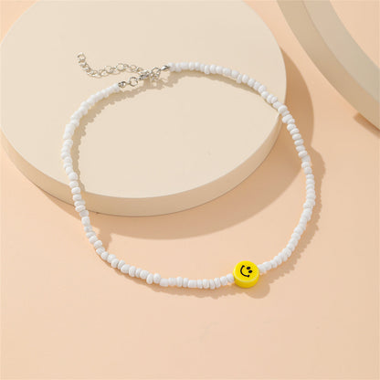 Yellow and White Howlite Smiley Face Beaded Necklace, pendant necklace for women, dainty minimalist design, side view