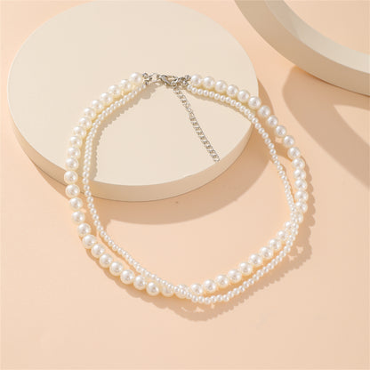 Silver-Plated and Pearl Layered Necklace, silver pendant necklace for women, dainty minimalist design, detail close-up