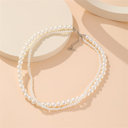 Silver-Plated and Pearl Layered Necklace, silver pendant necklace for women, dainty minimalist design, lifestyle look
