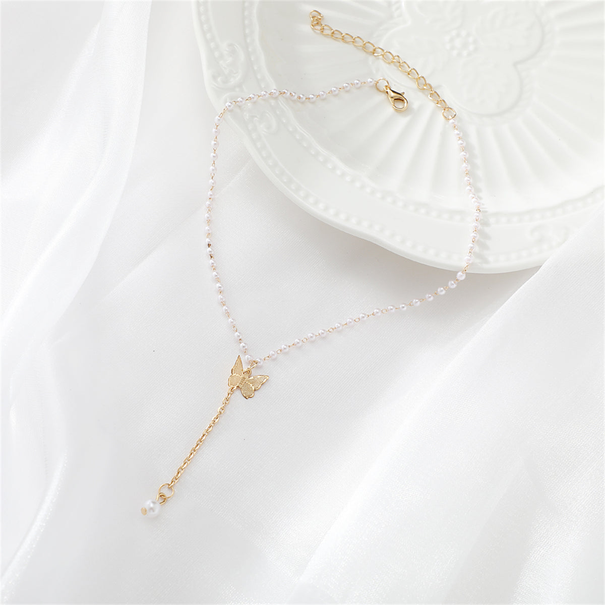 Pearl and 18K Gold-Plated Butterfly Drop Necklace, gold pendant necklace for women, botanical inspired, detail close-up