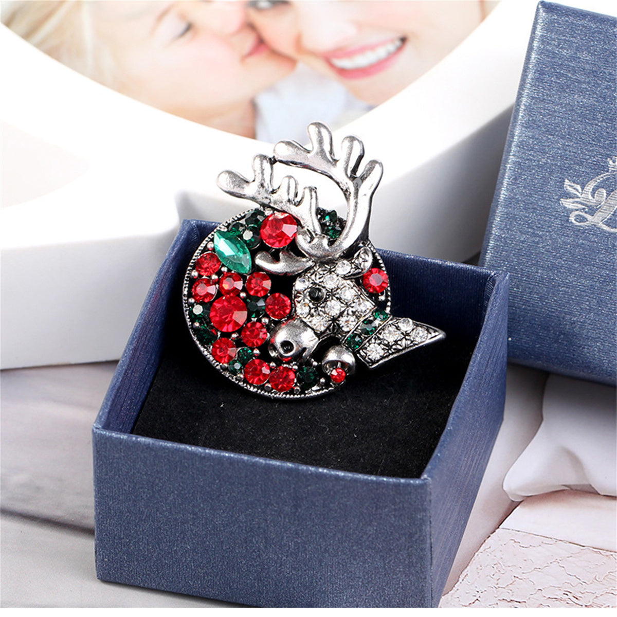 Green Crystal and Cubic Zirconia Silver-Plated Reindeer Brooch, silver brooch pin, vintage-inspired design, side view