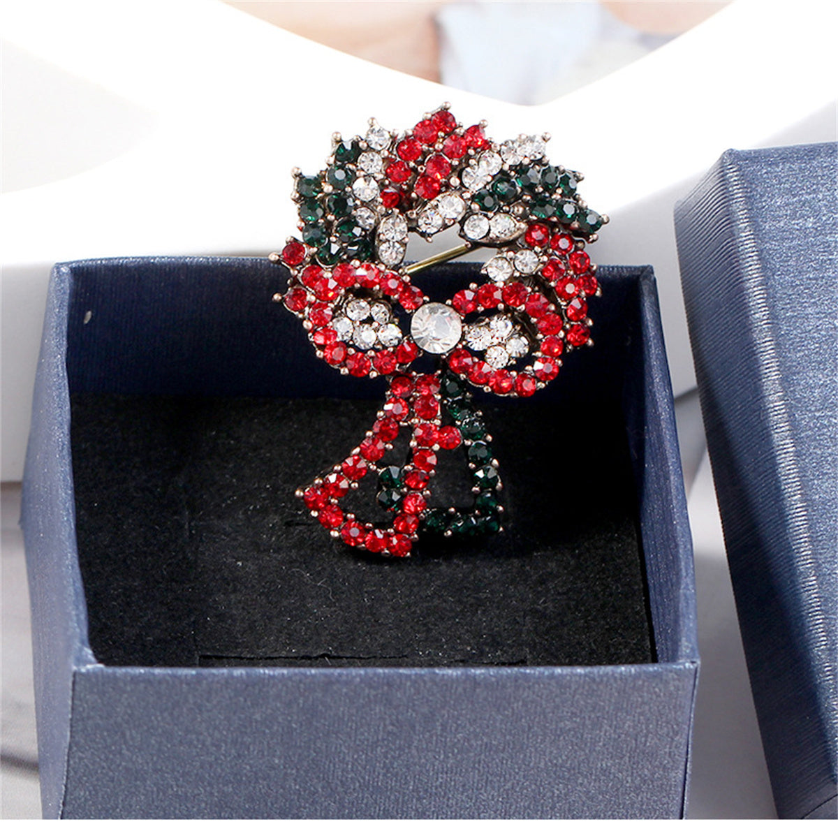 Red Cubic Zirconia and Silver-Plated Christmas Wreath Brooch, silver brooch pin, botanical inspired, side view