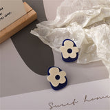 Blue & White Floral Stud Earrings