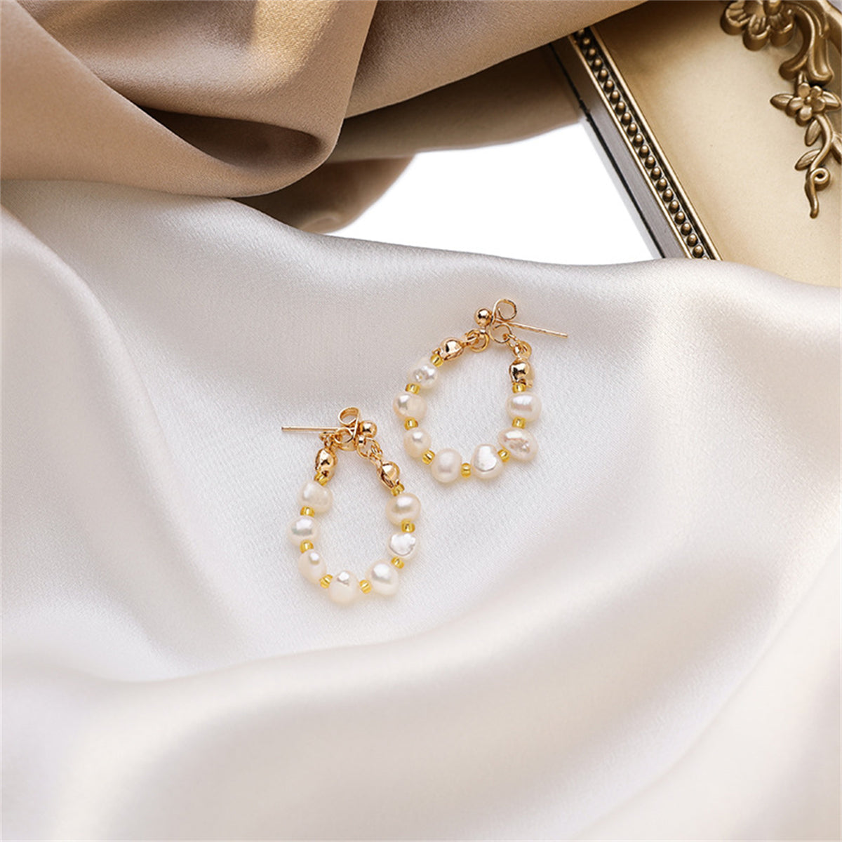 Pearl and 18K Gold-Plated Teardrop Ear Jackets, gold drop earrings for women, dainty minimalist design, lifestyle look