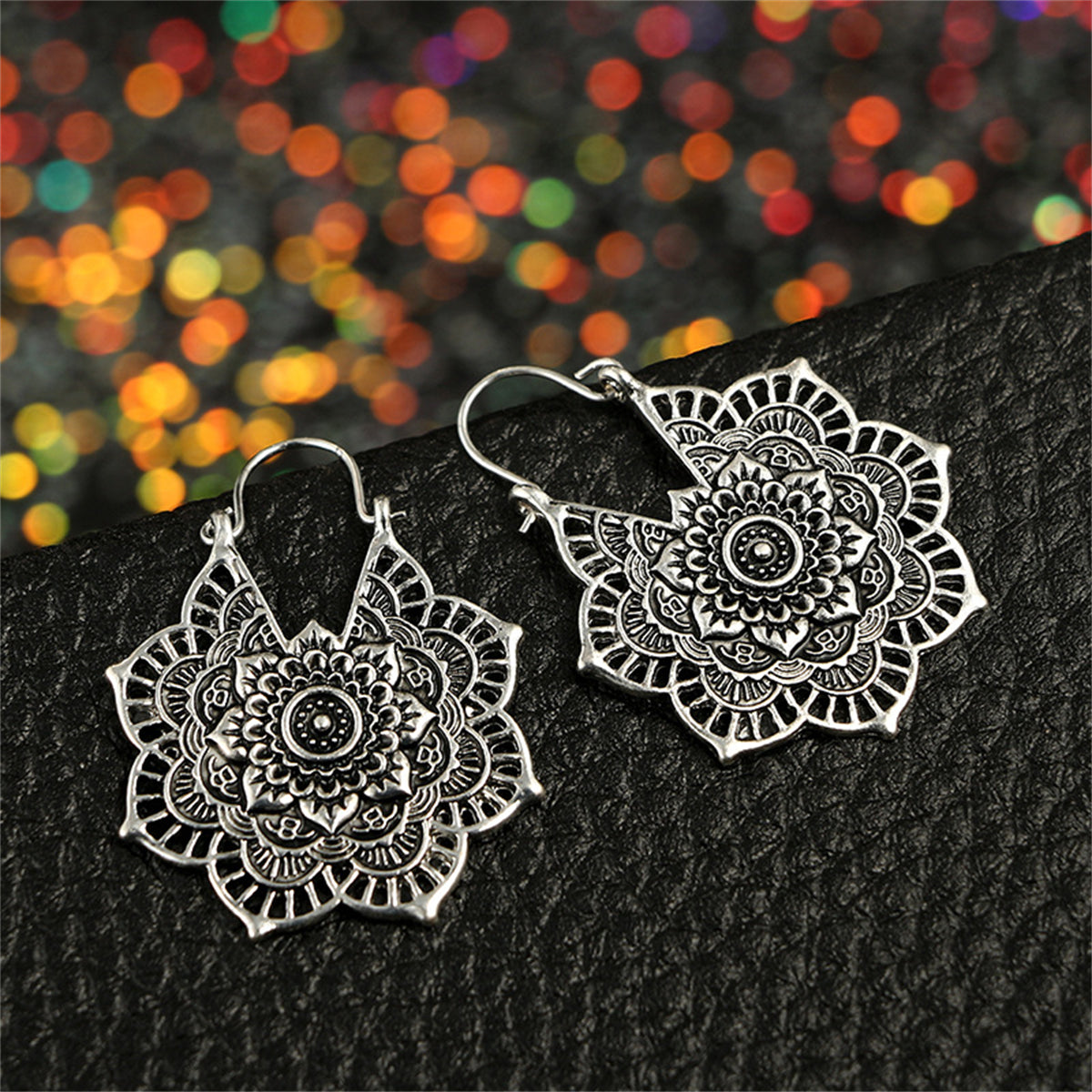 Silver-Plated Floral Huggie Earrings, silver huggie earrings, botanical inspired, detail close-up