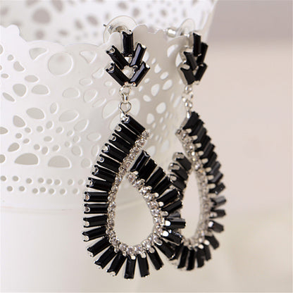 Black and Silver-Plated Baguette Open Teardrop Earrings, silver drop earrings for women, botanical inspired, detail close-up