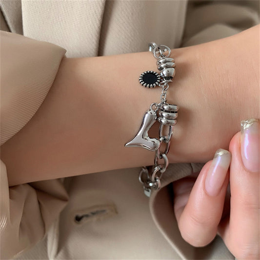 Cubic Zirconia and Silver-Plated Heart Charm Bracelet, silver bracelet for women, vintage-inspired design, front view