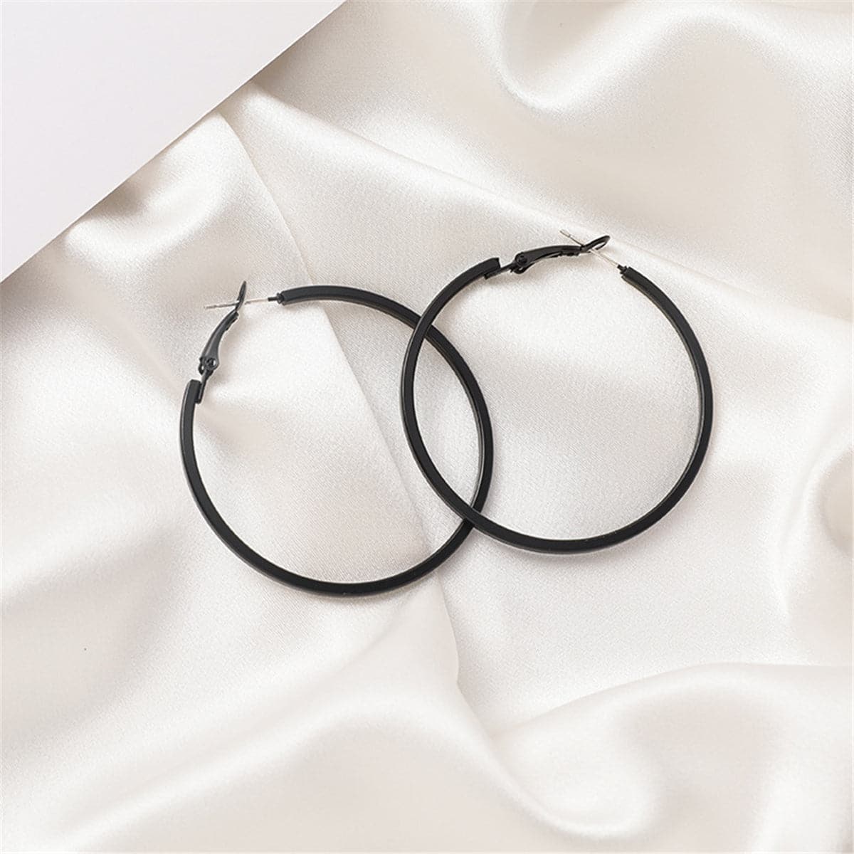 Black Hoop Earrings, dainty minimalist design, styled look