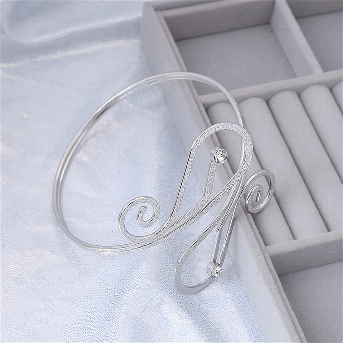 Cubic Zirconia and Silver-Plated Frosted Geometric Arm Cuff, dainty minimalist design, side view